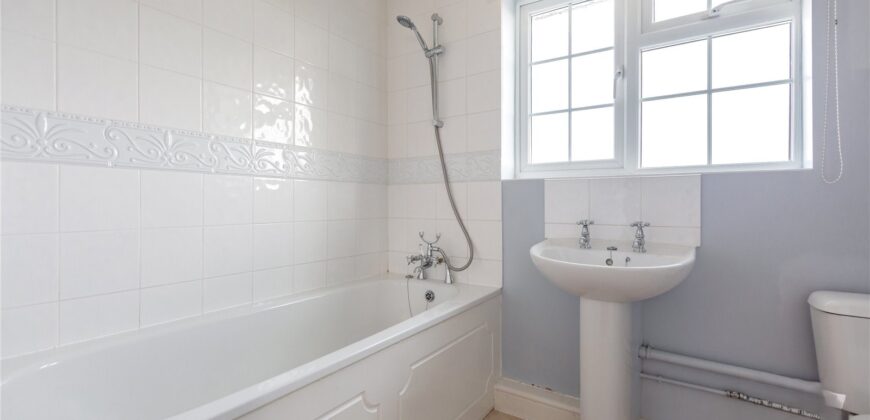 Spacious 4-Bedroom Family Home with Double Garage & Conservatory in Prime Location
