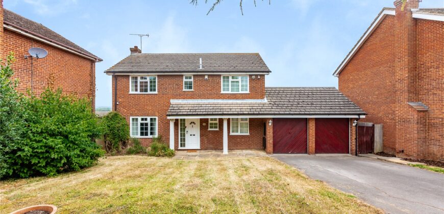 Spacious 4-Bedroom Family Home with Double Garage & Conservatory in Prime Location