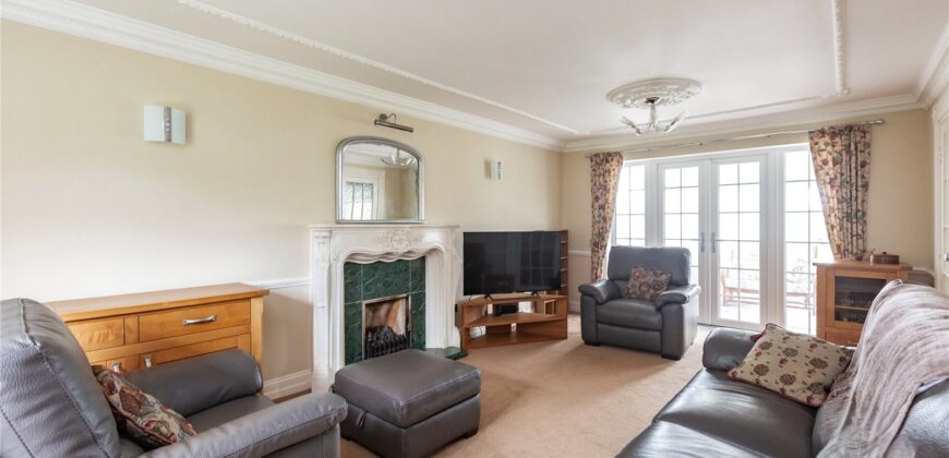 Spacious 4-Bedroom Family Home with Double Garage & Conservatory in Prime Location