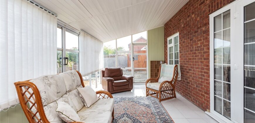 Spacious 4-Bedroom Family Home with Double Garage & Conservatory in Prime Location